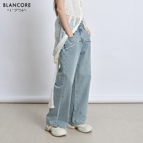 Deconstructed straight-leg jeans