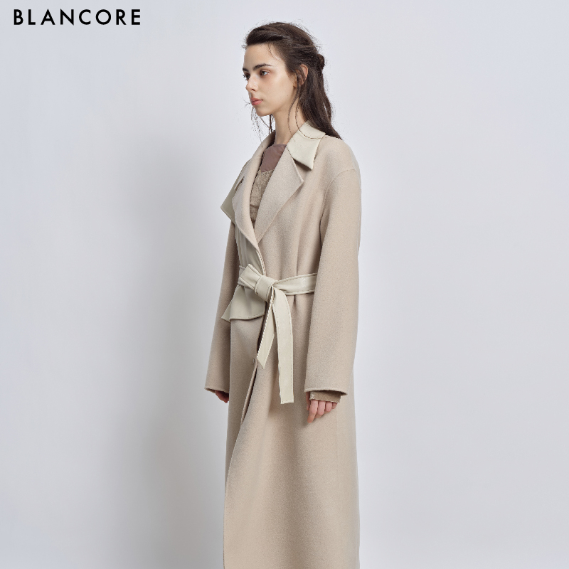 faux leather paneled coat with belt